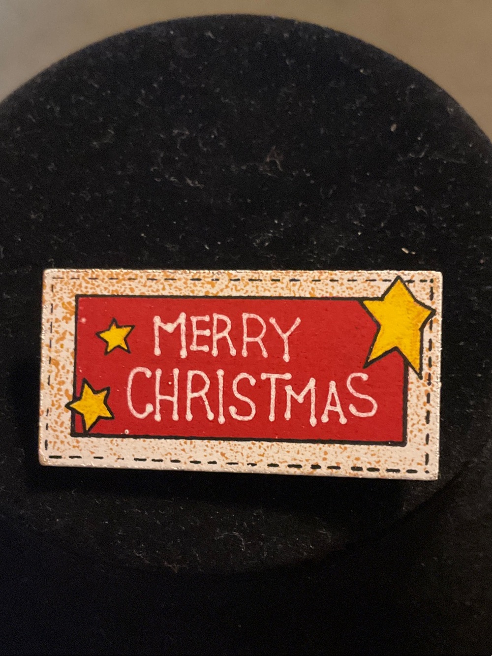 Festive 'Merry Christmas' Wooden Pin with Yellow Stars